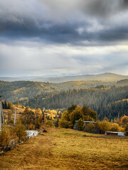 Sunny Autumn Carpathians with Puffy White Clouds