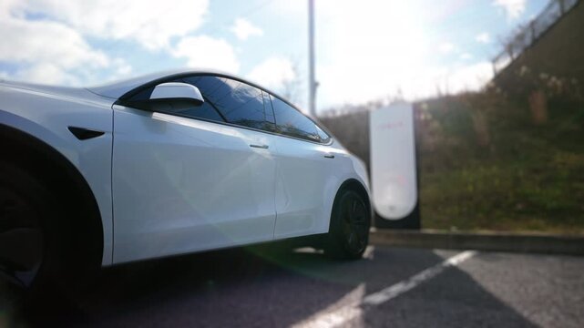 Charging an EV at a Supercharger