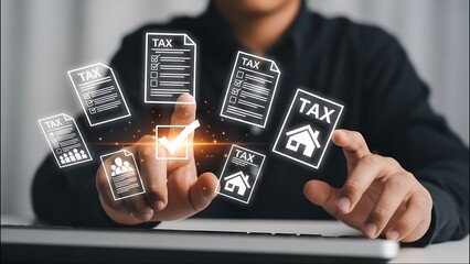 Businessman managing taxes with digital interface on laptop screen