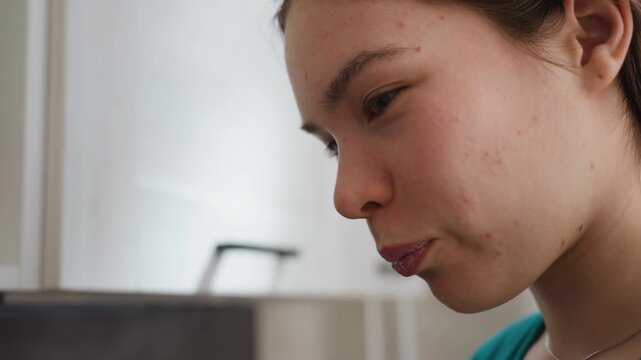 Closeup Young Woman Taking Pill, Concentrated Expression With Hand Placing Tablet On Tongue, Indoor Kitchen Backdrop, Soft Daylight, Visible Skin Texture And Candid Medical Adherence Moment, Private