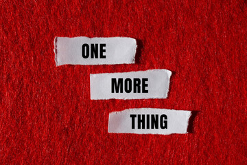 One More Thing message written on ripped torn paper background. Conceptual One More Thing symbol. Copy space.