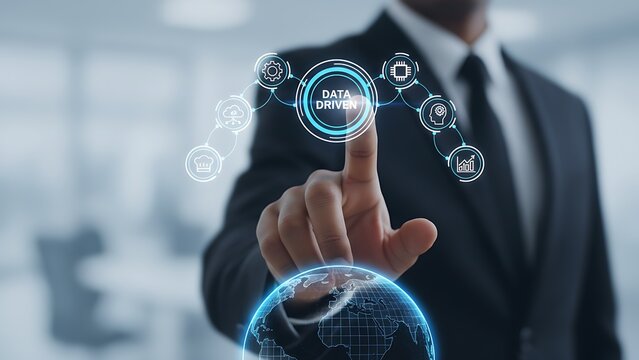 A business person navigates the digital world by interacting with a modern interface with a fingertip that represents data driven and technological innovation. - Powered by Adobe