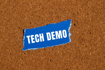 Tech Demo message written on ripped torn paper background. Conceptual Tech Demo symbol. Copy space.