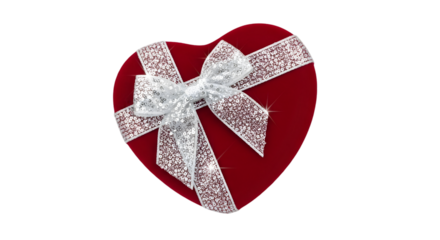 A red heart shaped gift box with a white ribbon