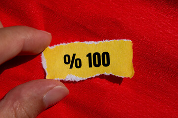One hundred percent message written on ripped torn paper background. Conceptual One hundred percent symbol. Copy space.