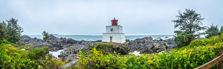 Amphitrite point lighthouse guiding ships near ucluelet on vancouver island