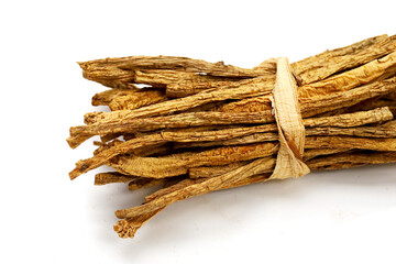 Dried brown Codonopsis root sticks used in Chinese herbal medicine.