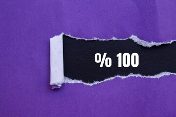 One hundred percent message written on ripped torn paper background. Conceptual One hundred percent symbol. Copy space.