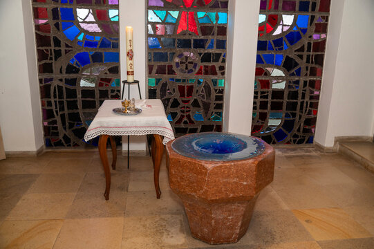 babtism fountain with table with crism oil