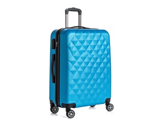 A vibrant, geometric-patterned turquoise rolling suitcase stands upright, its handle extended. Four wheels are visible