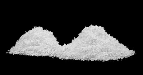 Heap of white fluffy snow isolated on a black background. White snow hills. White snow at night.