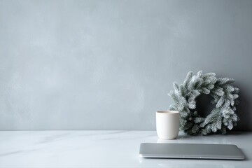 minimal workspace with christmas wreath and neutral colors, modern corporate holiday background