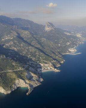 Aerial view of the Amalfi Coast's dramatic cliffs meet the Tyrrhenian Sea in a stunning display of natural beauty, Erchie, Amalfi Coast, Campania, Italy.