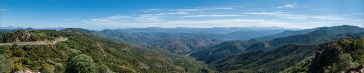 Naklejka premium Panoramic view of andalusian mountains under clear blue sky