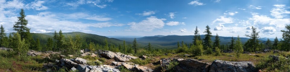 Scenic mountain panorama with lush forest and clear blue sky