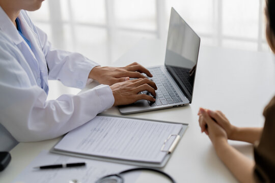 doctor consults with a patient during a medical examination in a clinic