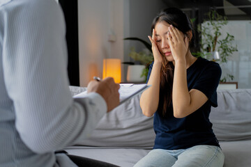 professional psychologist counsels a sad patient in a clinic therapy room