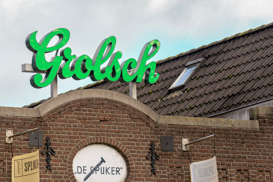 Grolsch sign on the cafee on a sunny day on a street during the day in a city   - Netherlands. Eindhoven 26-10-2025