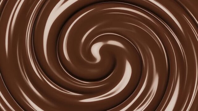 Swirling chocolate sauce creates a mesmerizing spiral pattern in a close-up overhead shot