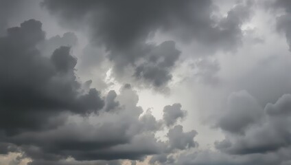 A moody sky filled with dark, ominous clouds, hinting at an approaching storm