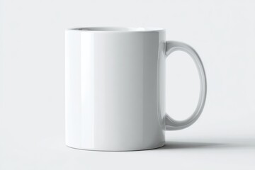 Blank white ceramic coffee mug isolated on a light background.