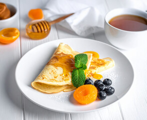 cr&ecirc;pes aux fruits, cranberries, myrtilles, orange