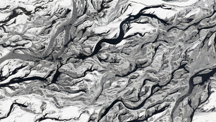 Aerial view of glacial rivers carving through the icy terrain, creating a striking contrast of dark water against the stark white landscape, Iceland, Iceland.