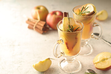Warm apple autumn drink with cinnamon