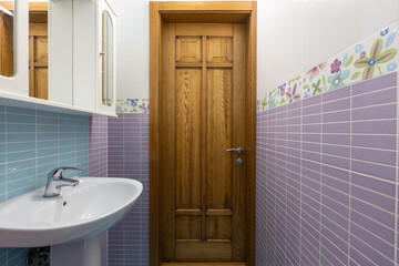 modern bathroom room with toilet and washing machine
