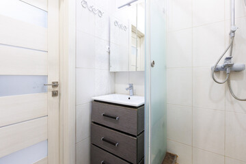 modern bathroom room with toilet and washing machine