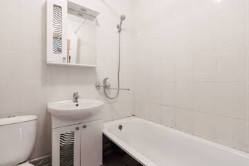 modern bathroom room with toilet and washing machine