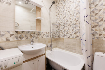 modern bathroom room with toilet and washing machine