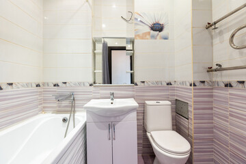modern bathroom room with toilet and washing machine