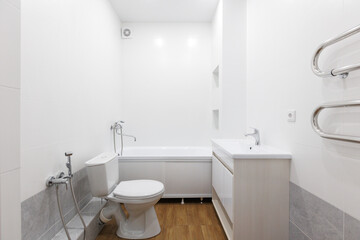 modern bathroom room with toilet and washing machine