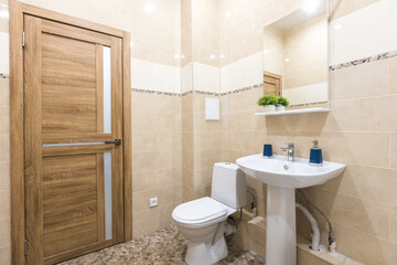 modern bathroom room with toilet and washing machine
