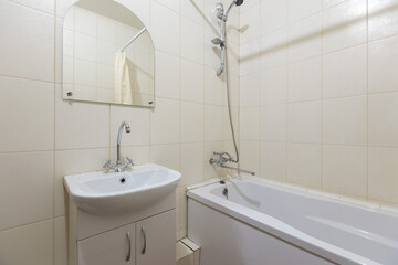 modern bathroom room with toilet and washing machine