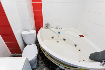 modern bathroom room with toilet and washing machine