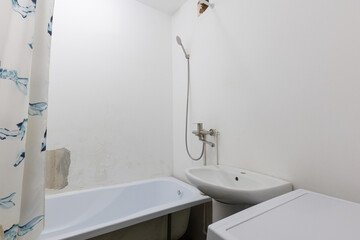 modern bathroom room with toilet and washing machine