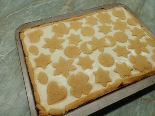 baking of a sweet cheesecake in kitchen