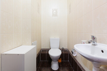 modern bathroom room with toilet and washing machine