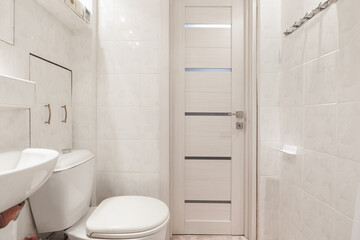 modern bathroom room with toilet and washing machine