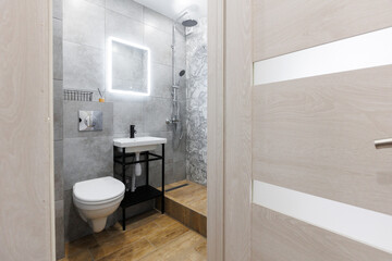 modern bathroom room with toilet and washing machine