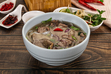 Vietnamese Pho Bo soup with beef and noodles