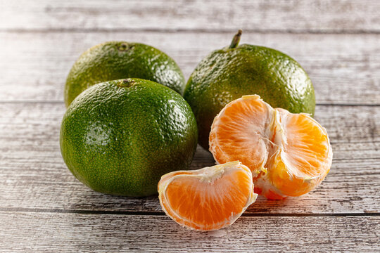 Sweet green juicy tangerin heap