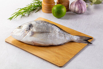 Raw fresh uncooked dorada fish