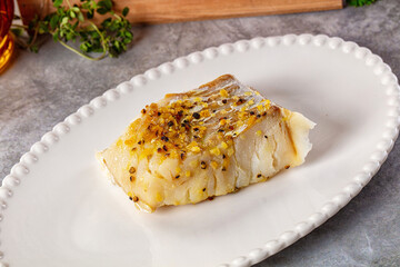Steamed cod fish fillet with spices