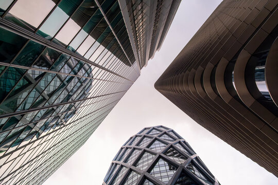 Geometric skyscrapers architecture in La Defense Paris showing corporate business offices with modern urban perspective and strong architectural lines