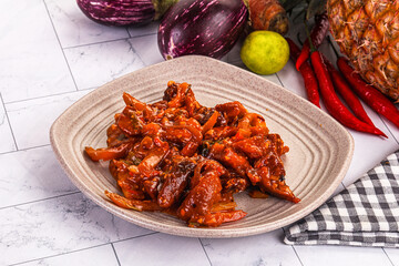 Asian cuisine - pork in chili sauce