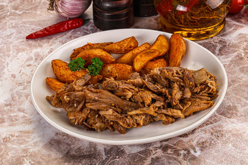 Baked shredded pork with potato