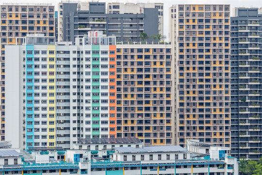 Aerial view of colourful Housing Development Board (HDB) flats showcasing a vibrant tapestry of urban living at Lorong 6 Toa Payoh, Singapore, Singapore.